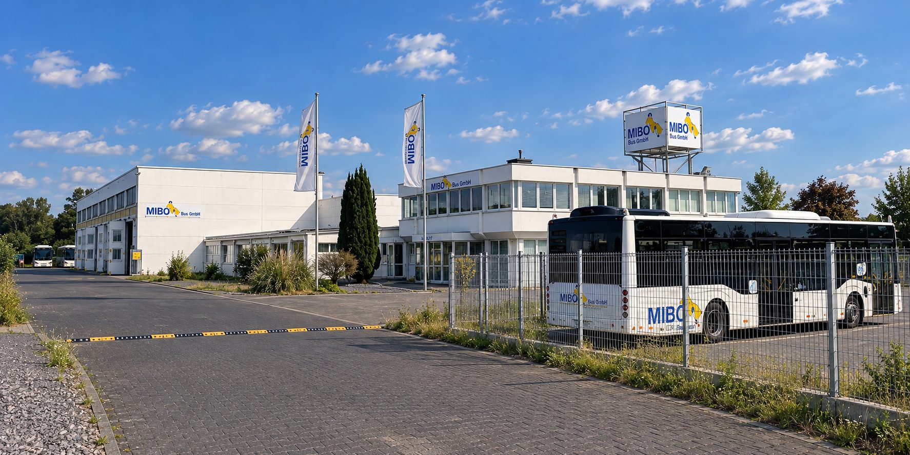 Firmengelände von MIBO in Andernach mit Bus